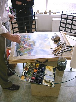 Professor Michail Lewkowitsch malt ein Bild fr die Info-Galerie
